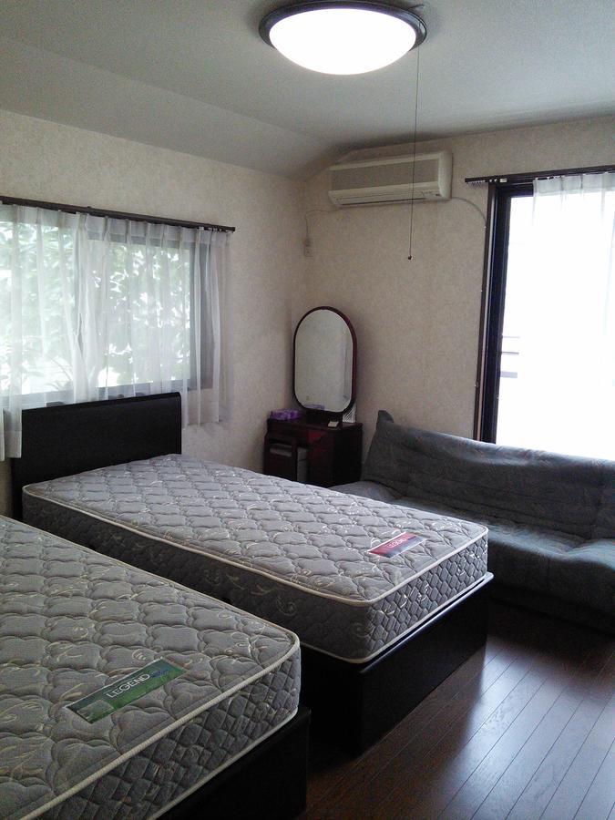 Guesthouse Cosmo Токусима Экстерьер фото