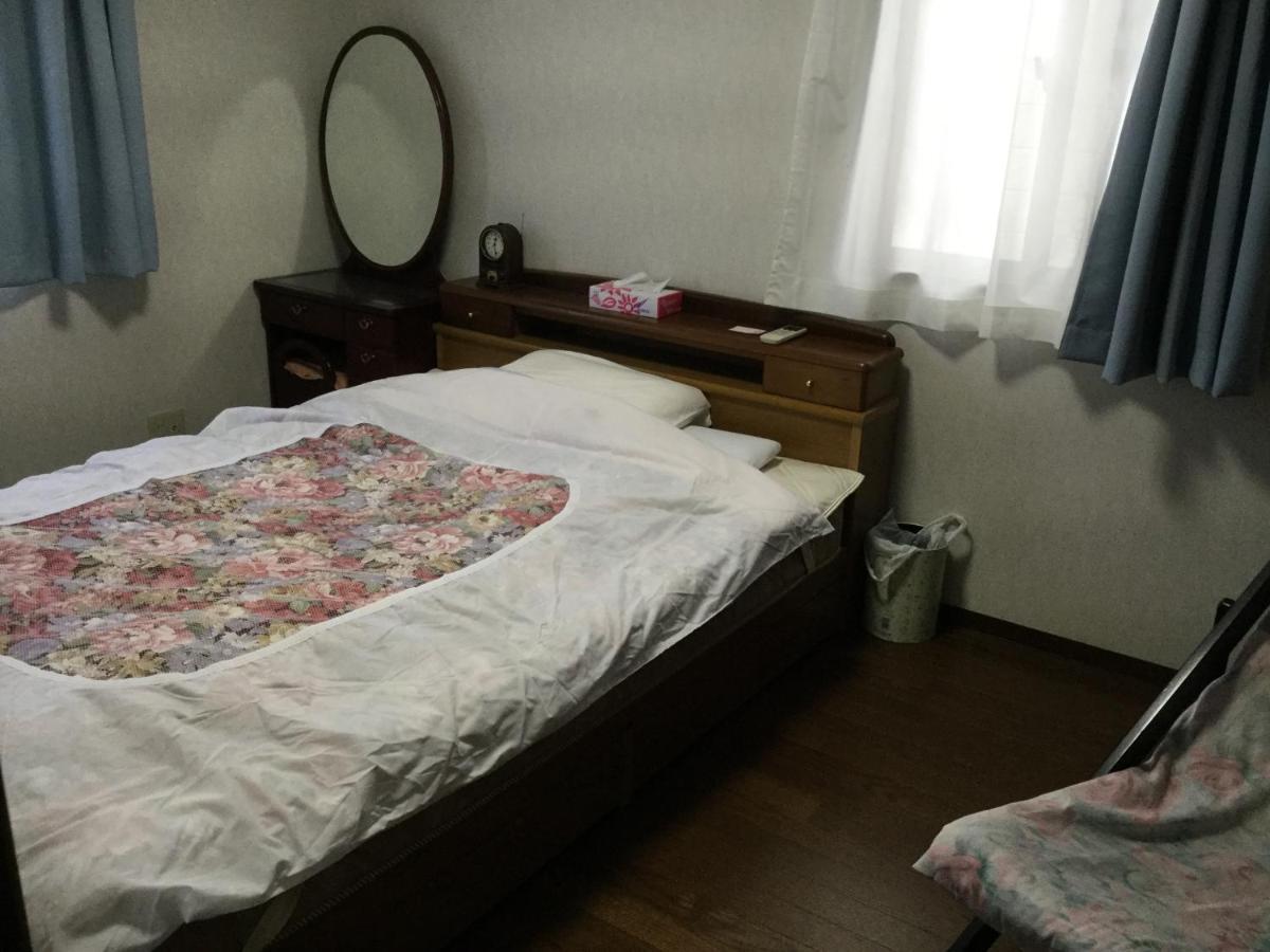 Guesthouse Cosmo Токусима Экстерьер фото